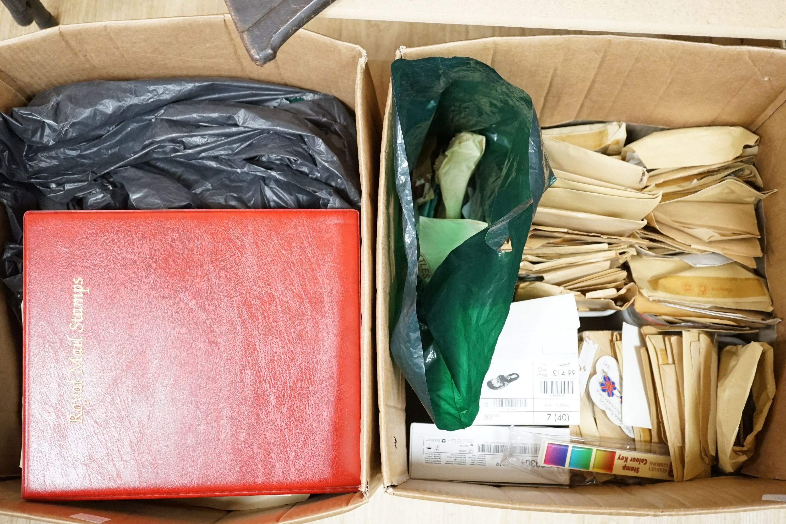 Two boxes of world stamps